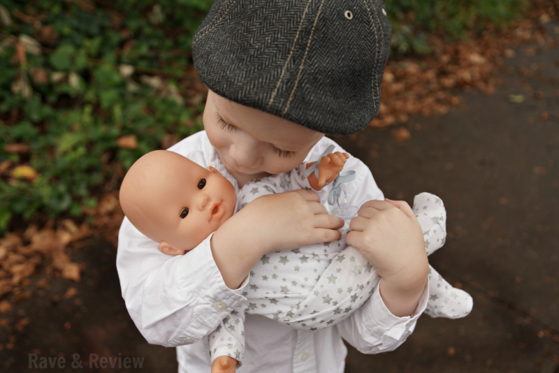 Holding Corolle baby doll