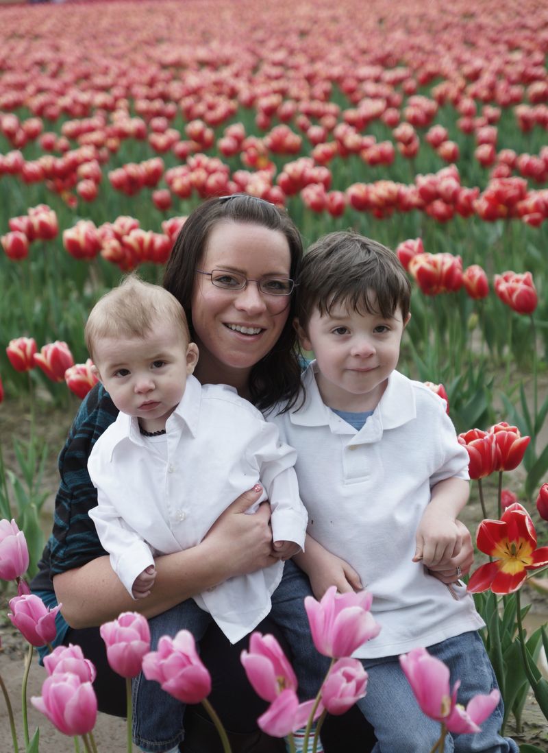 Jeanne and boys in tulips