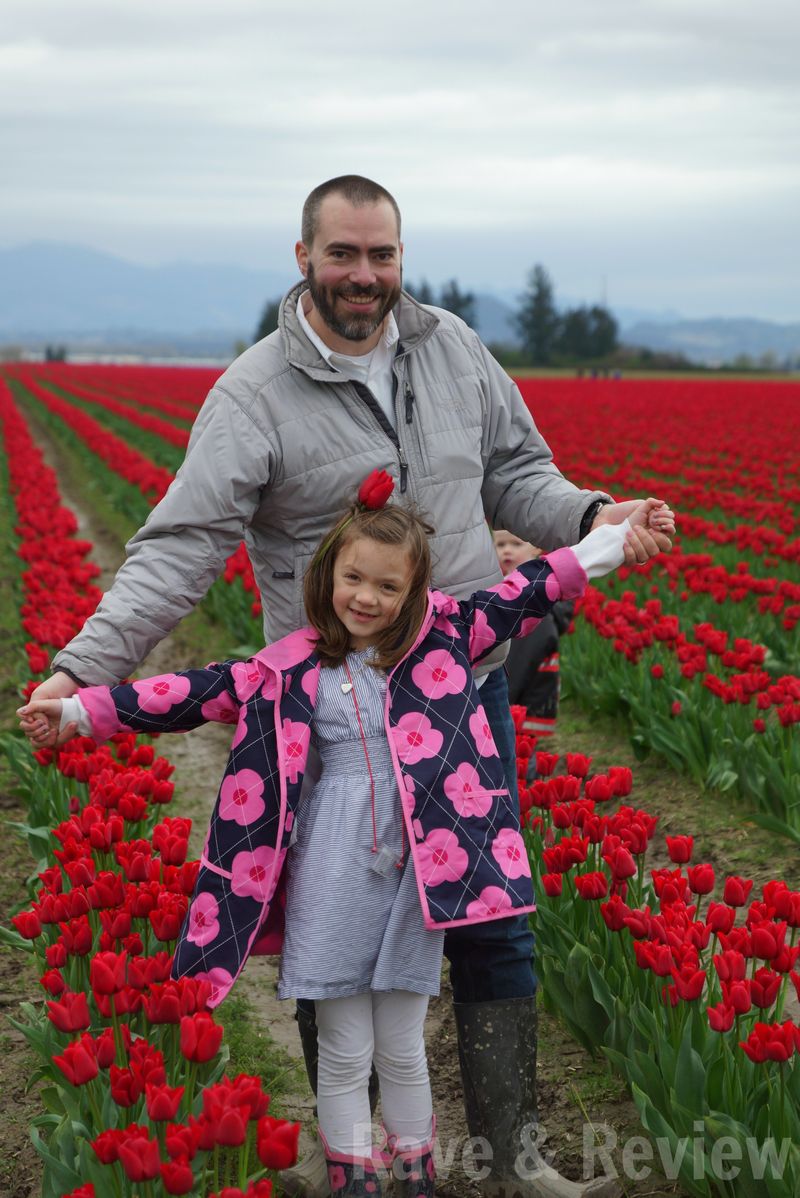 Family in tulip field