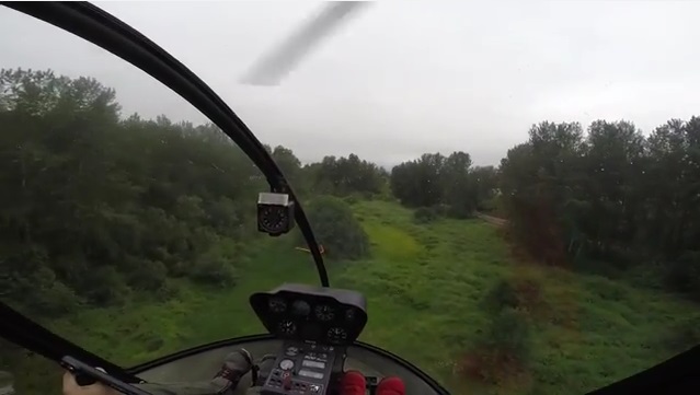 Cloud 9 Living landing helicopter in trees