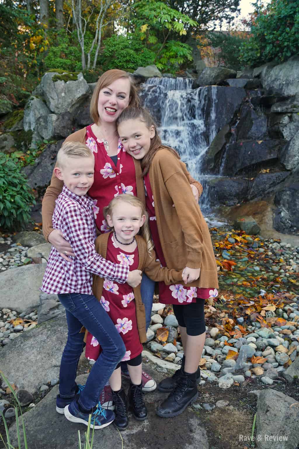 Mama and kiddos by waterfall